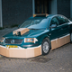 Illustration for article titled This Artist Turns Boring Rides Into Supercars At Night Using Cardboard